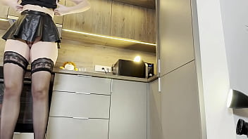 Amazingly beautiful hot and horny girl in stockings in the kitchen flashes her tight pussy and ass