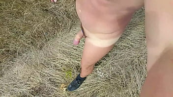 He is walking naked in the public park among the trees