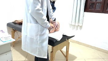 Proctologist performs anal exam on constipated patient.